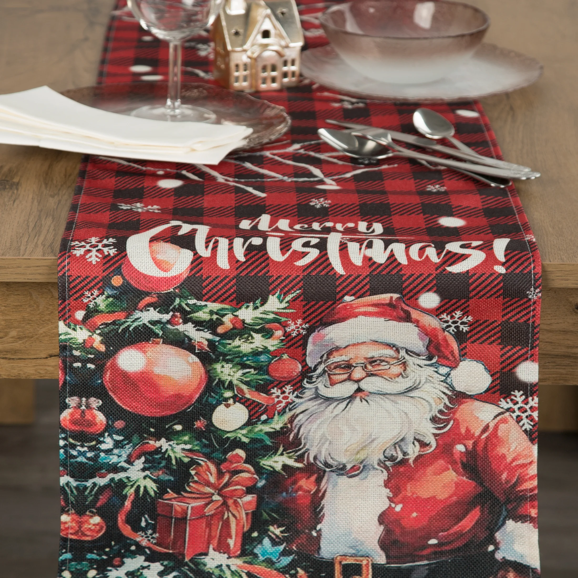 Bieżnik świąteczny na stół 33x183 cm czerwono, zielony zdobiony uroczym nadrukiem Mikołaja Eurofirany