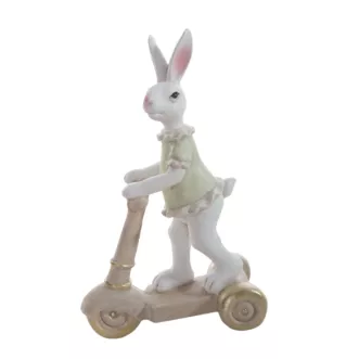 Wielkanocna figurka dekoracyjna uroczego zajączka na hulajnodze w miętowo, beżowej kolorystyce Eurofirany