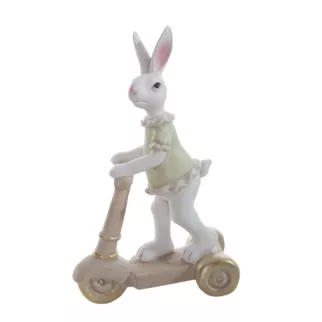 Wielkanocna figurka dekoracyjna uroczego zajączka na hulajnodze w miętowo, beżowej kolorystyce Eurofirany