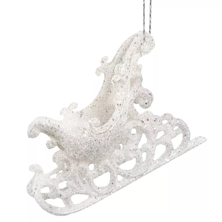 Biała zawieszka na choinkę ażurowe sanie ze srebrnym brokatem 14x10 cm Eurofirany