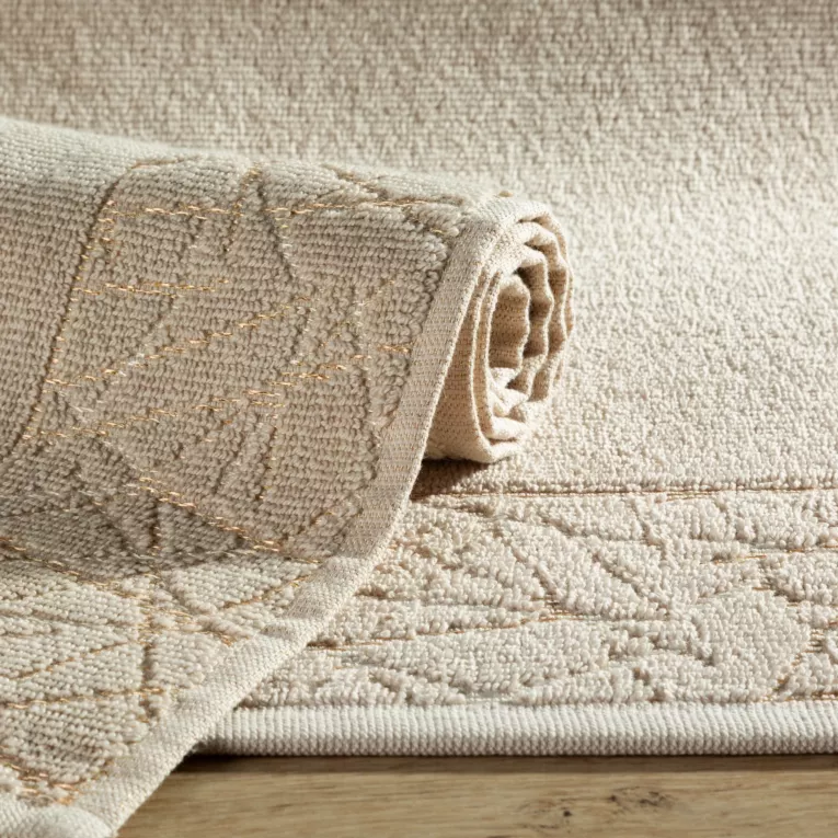 Dywanik łazienkowy NIKA z bawełny z geometrycznym błyszczącym wzorem Eurofirany