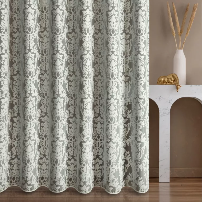 Firana szyta na tunelu naturalna ekskluzywna z wzorem ornamentowym na organtynie, wykończona obciążnikiem Pierre Cardin