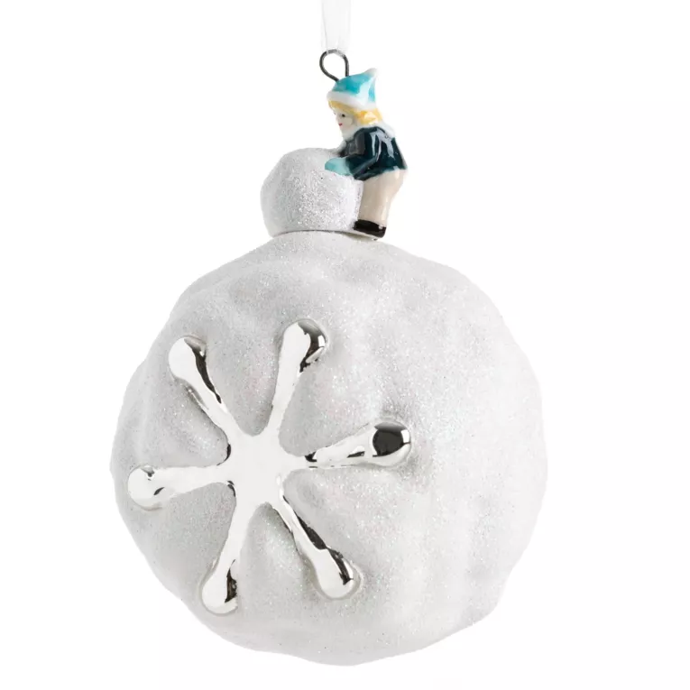 Biała szklana bombka choinkowa w formie śnieżnej kuli z chłopczykiem 8 cm Eurofirany