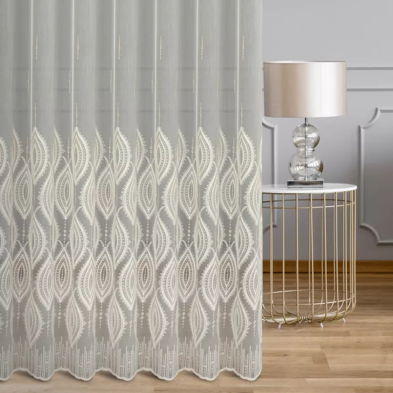 Firana szyta na tunelu naturalno beżowa z delikatnej tkaniny typu aden, wykończonej łańcuszkowym haftem Italissima Eva Minge