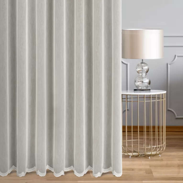 Firana szyta na tunelu kremowa z matowej przezroczystej tkaniny haftowanej w falujący wzór