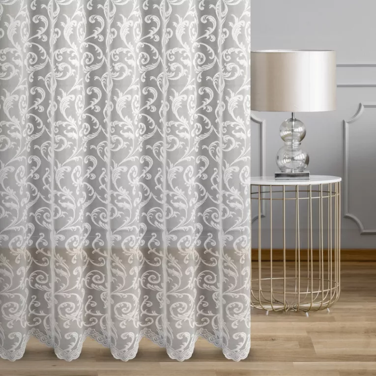 Firana szyta na tunelu biała z tkaniny żakardowej o nieregularnym wzorze wykończona połyskiem