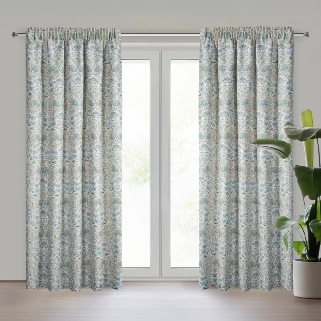 Zasłona biało, niebieska z tkaniny zaciemniającej zdobiona nadrukiem roślinnym 135x250 cm przelotki - ASHLEY Eurofirany