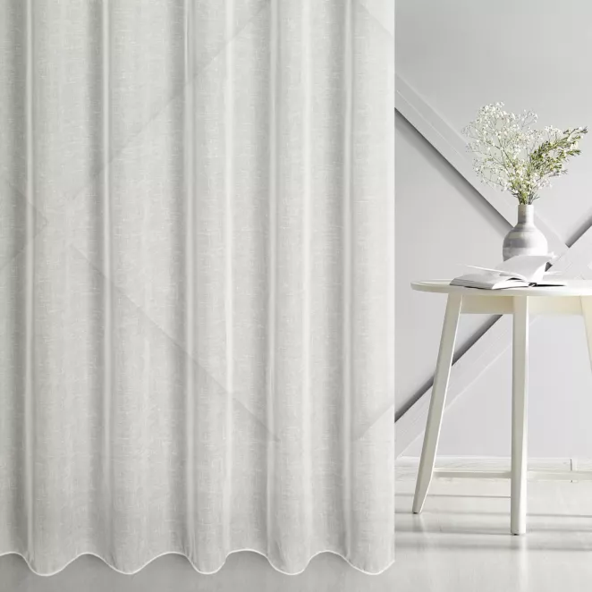 Firana szyta na tunelu naturalno kremowa z matowej etaminy o naturalnym splocie w stylu eko, wykończona obciążnikiem