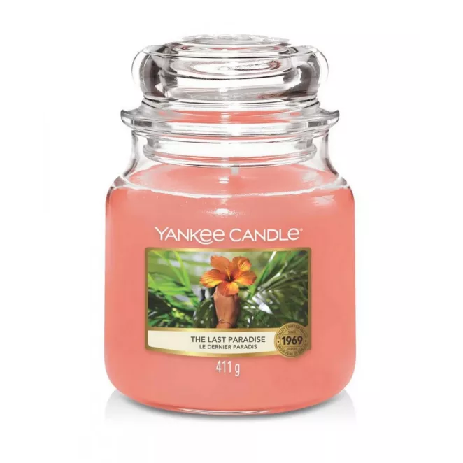 Średnia świeca zapachowa w szklanym słoiku z pokrywką YANKEE CANDLE o zapachu  The Last Paradise