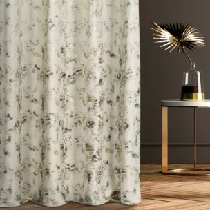 Zasłona szyta na taśmie fala kremowo szampańska z welwetowej tkaniny z błyszczącym nadrukiem od dołu