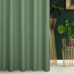 Zasłona szyta na taśmie fala miętowa z gładkiej tkaniny zaciemniającej typu dimout wykończona obciążnikiem