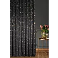 Zasłona szyta na taśmie fala czarno złocista z tkaniny welwetowej zdobionej połyskującym drukiem