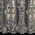 Firana szyta na przelotkach naturalno beżowa z przezroczystej organtyny ozdobionej dużym, połyskliwym wzorem ornamentowym, wykończona obciążnikiem Italissima Eva Min