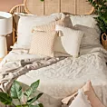 Poszewka na poduszkę 45x45 cm bawełniana zdobiona chwostami na rogach beżowa SEVILLE TERRA COLLECTION Eurofirany