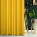 Zasłona szyta na przelotkach żółta z gładkiej tkaniny zaciemniającej typu dimout wykończona obciążnikiem