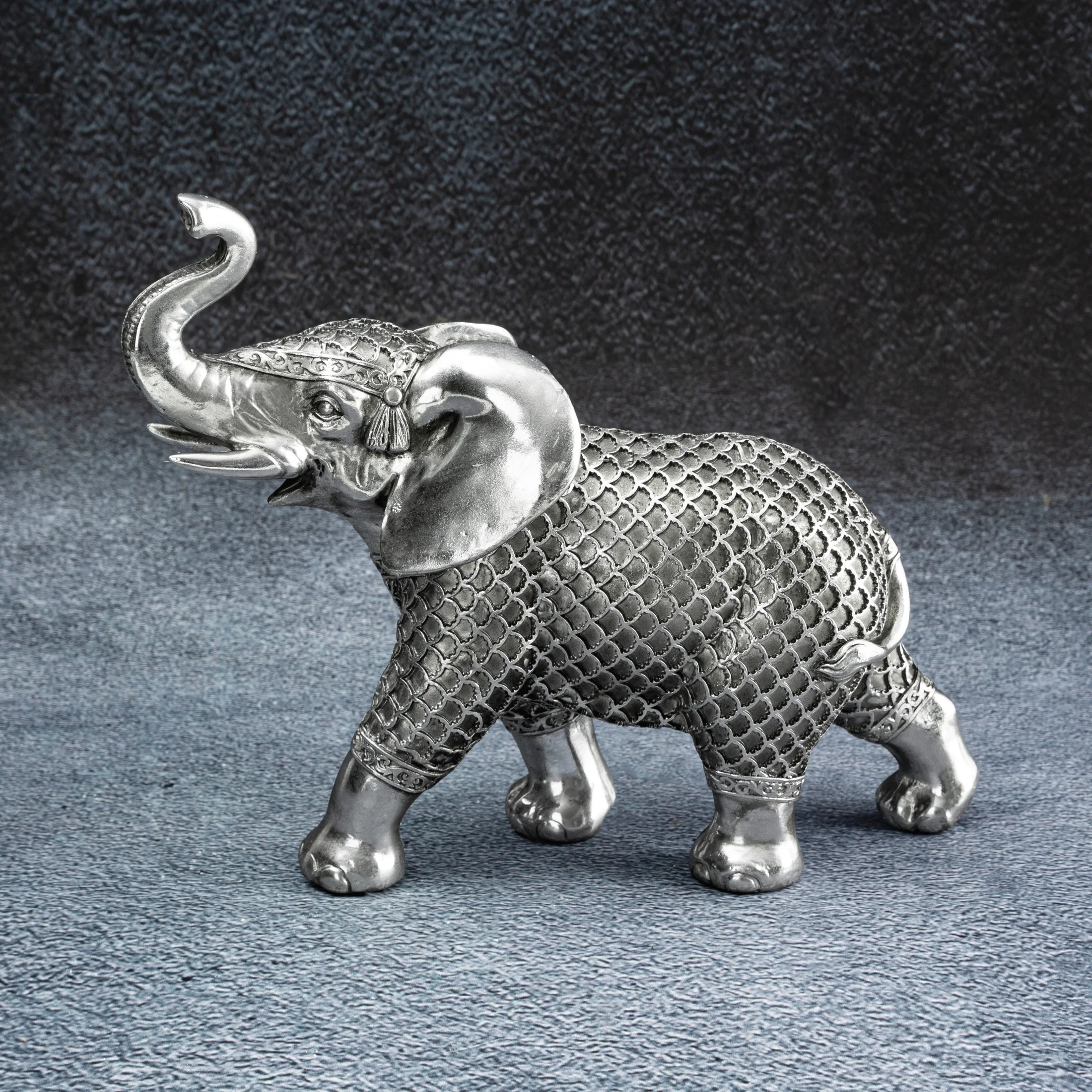 Figurka ceramiczna stalowo-srebrna słoń o drobnym wytłaczanym wzorze kratki 9x25x20 cm EVAN Eurofirany