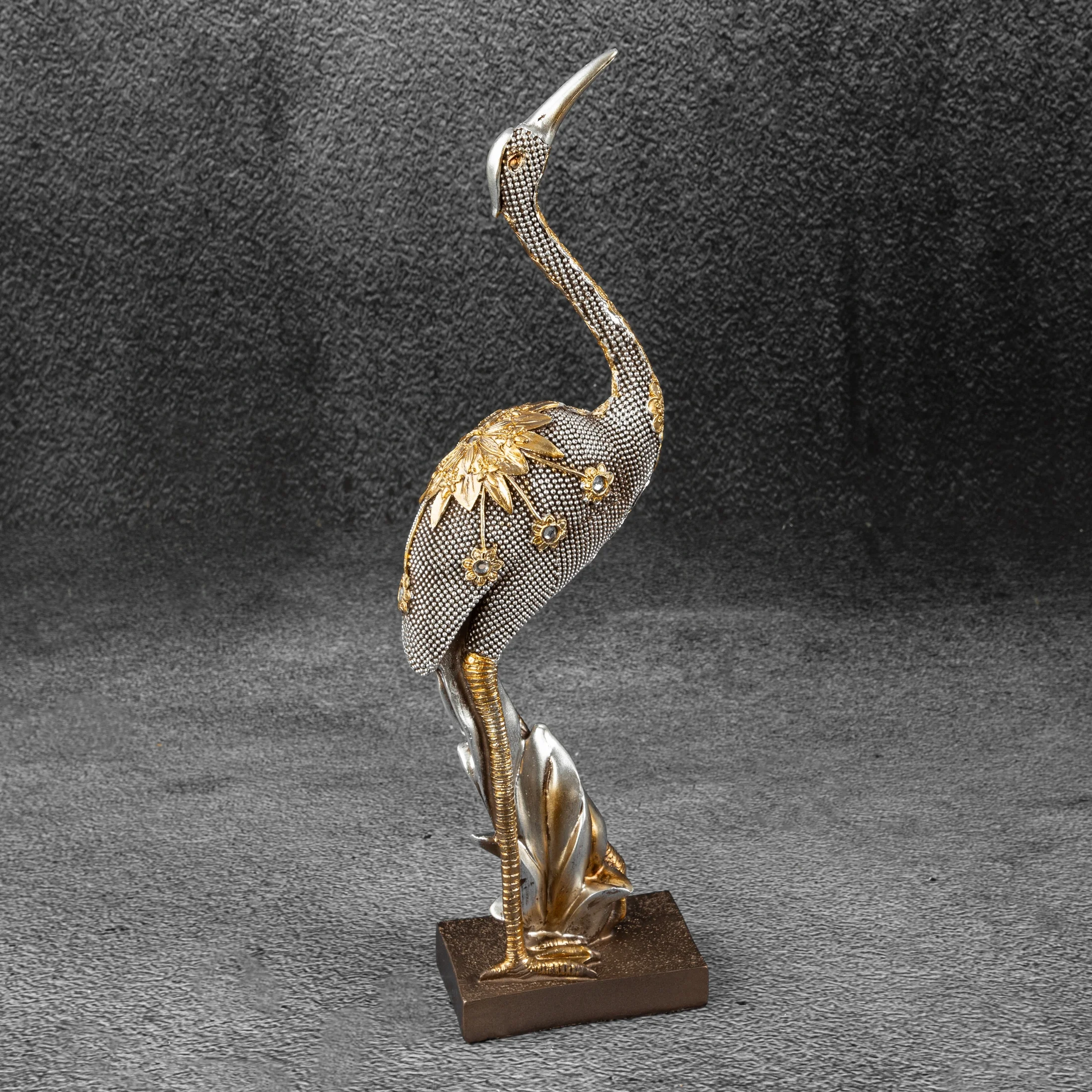 KALI srebrna figurka dekoracyjna czapla w nowoczesnym stylu 10x6x36 cm Eurofirany