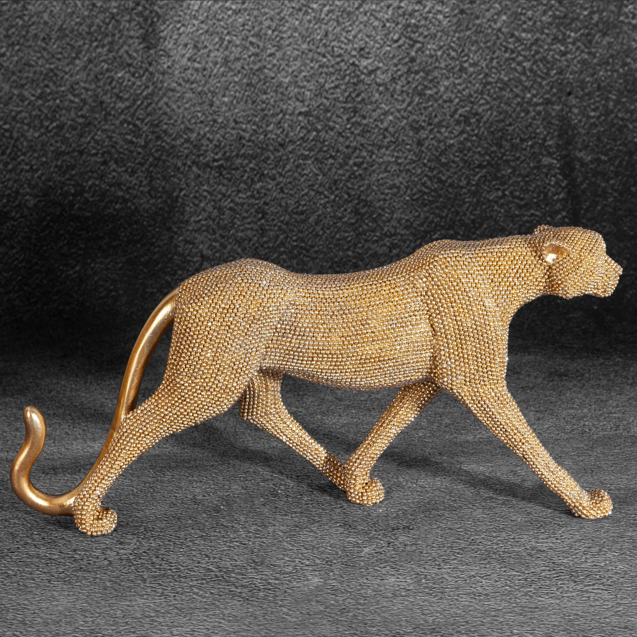 Figurka złota pantera o drobnym strukturalnym wzorze 31x 6x15 cm ELDO Eurofirany