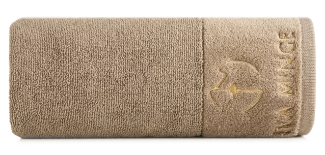 Ręcznik kąpielowy 50X90 cm bawełniany kolor beżowy z haftowanym logiem Eva Minge 550 g/m2 GAJA Eurofirany